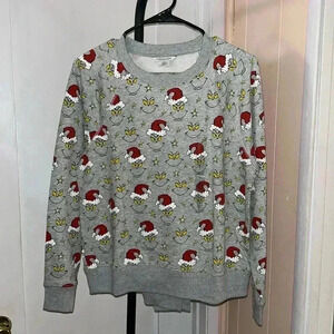 Grinch Christmas sweatpants and sweatshirt.